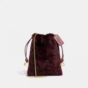 Coach Drawstring Pouch In Shearling - Women's Crossbody Bags - Brass / Sangria | GNAI8670