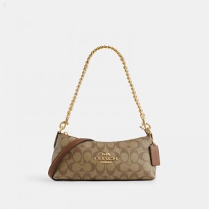Coach Charlotte Shoulder Bag In Signature Canvas - Women's Shoulder Bags - Gold / Khaki Saddle | DWKV9688
