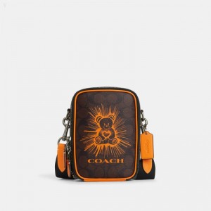 Coach Stanton Crossbody In Signature Canvas With Bear - Men's Crossbody Bags - Mahogany / Bright Mandarin | ZDYN3032