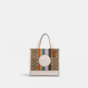 Coach Dempsey Tote 22 In Signature Jacquard With Rainbow Stripe And Coach Patch - Women's Tote Bags - Silver / Khaki Multicolor | VCEV2466